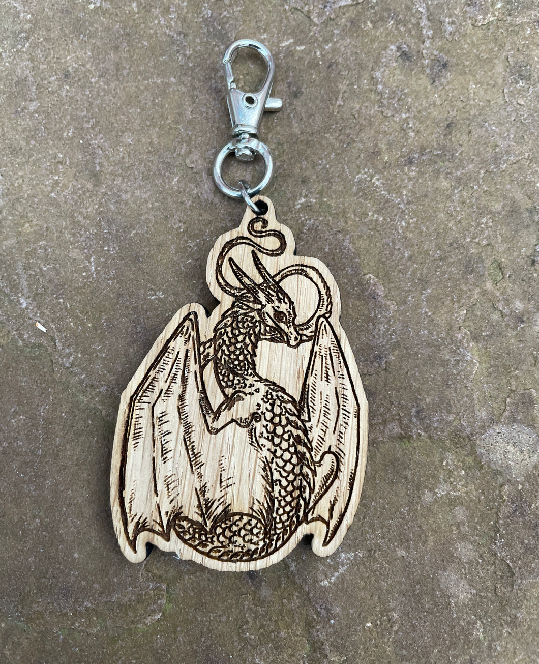 Elegant Dragon Engraved Wooden Charm