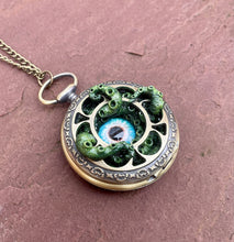Load image into Gallery viewer, Piercing Blue Eyed Pocket Kraken